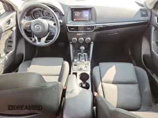 2016 Mazda CX-5 Sport with VIN JM3KE4BYXG0704194, listed as a Copart auction lot 62095735 with 93,970 mi miles and Salvage title. Bid and sale history available at DreamBid. Image 8.