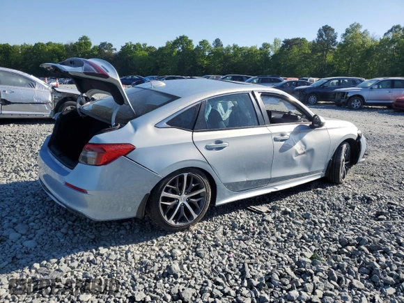 2023 Honda Civic Touring z VIN 2HGFE1F97PH305882, wystawiony jako Copart lot #54826915 z przebiegiem Nie podano mil oraz Szkoda całkowita • Salvage title. Historia ofert i sprzedaży dostępna na DreamBid. Obrazek 3.