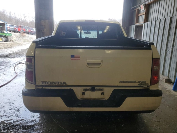 2010 Honda Ridgeline RTL with VIN 5FPYK1F57AB502049, listed as a Copart auction lot 87058684 with 228,156 mi miles and Clean Title. Bid and sale history available at carsss.com. Image 6.