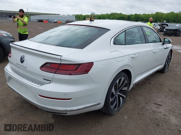 2021 Volkswagen Arteon SEL R-Line z VIN WVWSR7AN6ME007156, wystawiony jako IAAI lot #42254735 z przebiegiem 32 004 mil mil oraz . Historia ofert i sprzedaży dostępna na DreamBid. Obrazek 4.