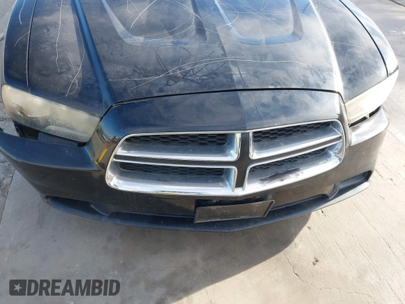 2012 Dodge Charger SE with VIN 2C3CDXBG5CH161579, listed as a IAAI auction lot 41312707 with 168,056 mi miles and . Bid and sale history available at DreamBid. Image 6.