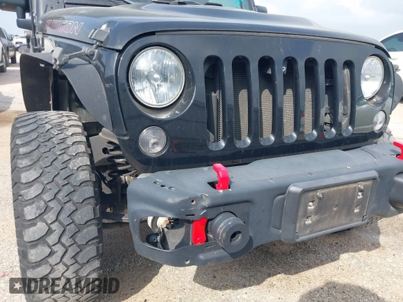 2015 Jeep Wrangler Unlimited Rubicon z VIN 1C4BJWFG2FL572417, wystawiony jako IAAI lot #41895927 z przebiegiem 54 981 mil mil oraz . Historia ofert i sprzedaży dostępna na DreamBid. Obrazek 6.