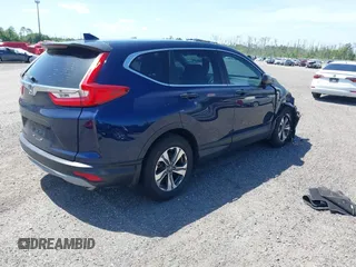 2019 Honda CR-V LX with VIN 2HKRW5H39KH400453, listed as a IAAI auction lot 40041024 with 76,932 mi miles and . Bid and sale history available at carsss.com. Image 4.