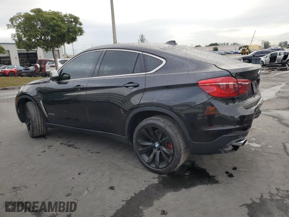 2017 BMW X6 sDrive35i with VIN 5UXKU0C36H0G69163, listed as a Copart auction lot 87044784 with 99,452 mi miles and Salvage Title. Bid and sale history available at carsss.com. Image 2.
