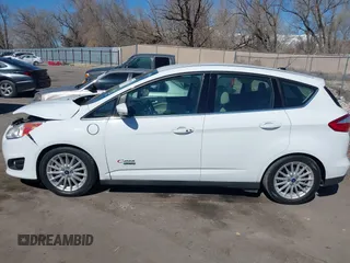 2016 Ford C-Max SEL z VIN 1FADP5CU8GL119275, wystawiony jako IAAI lot #41878985 z przebiegiem 39 580 mil mil oraz . Historia ofert i sprzedaży dostępna na DreamBid. Obrazek 14.