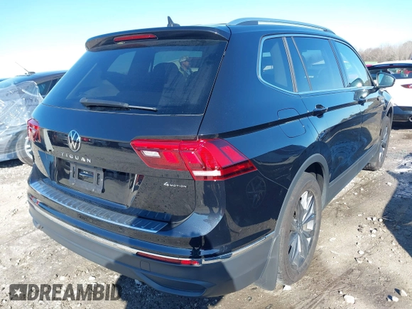 2023 Volkswagen Tiguan SE z VIN 3VVMB7AX7PM032629, wystawiony jako IAAI lot #41441468 z przebiegiem 52 518 mil mil oraz . Historia ofert i sprzedaży dostępna na DreamBid. Obrazek 4.