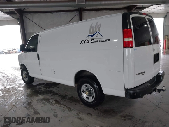 2014 Chevrolet Express Cargo Van with VIN 1GCWGFCA0E1138684, listed as a IAAI auction lot 41796495 with 101,756 mi miles. Bid and sale history available at carsss.com. Image 3.