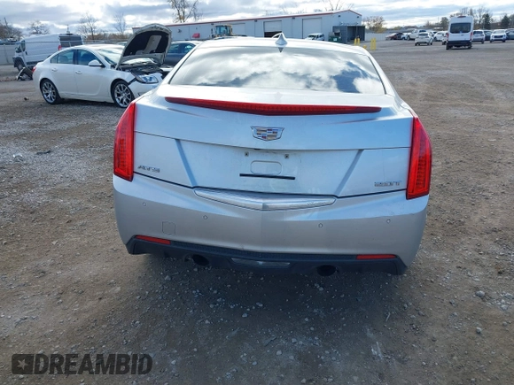 2015 Cadillac ATS Luxury RWD z VIN 1G6AB5RXXF0123831, wystawiony jako IAAI lot #40754245 z przebiegiem Nie podano mil oraz . Historia ofert i sprzedaży dostępna na DreamBid. Obrazek 16.