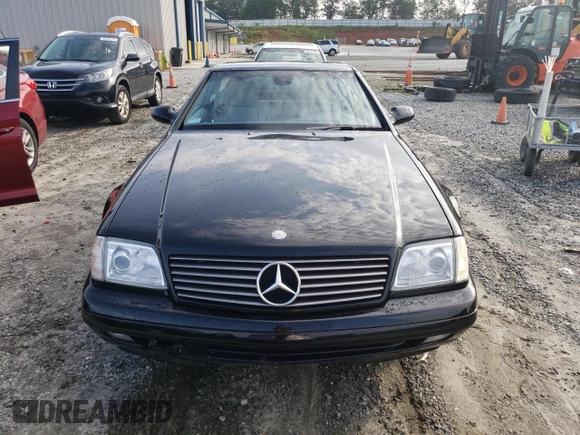2000 Mercedes-Benz SL-Class with VIN WDBFA68F0YF190618, listed as a Copart auction lot 64791414 with 24,489 mi miles and Salvage Title. Bid and sale history available at carsss.com. Image 5.