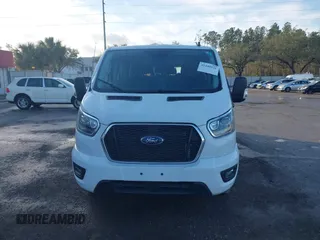 2023 Ford Transit Passenger XL with VIN 1FBAX2Y8XPKB33065, listed as a IAAI auction lot 41440531 with 21,155 mi miles and . Bid and sale history available at DreamBid. Image 12.