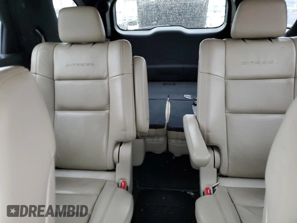 2014 Dodge Durango Citadel с VIN 1C4SDJET3EC592537, выставлен на аукционе Copart как лот 51525125 с пробегом 129 804 миль миль и Списание • Salvage title. История ставок и продаж доступна на DreamBid. Изображение 10.