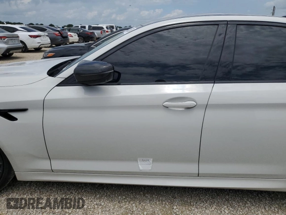 2023 BMW M5 with VIN WBS83CH05PCL80275, listed as a Copart auction lot 67145384 with 39,043 mi miles and Salvage Title. Bid and sale history available at carsss.com. Image 12.