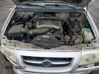 1999 Suzuki Grand Vitara JLX z VIN JS3TD62V9X4123460, wystawiony jako Copart lot #58574925 z przebiegiem 260 368 mil mil oraz Szkoda całkowita • Salvage title. Historia ofert i sprzedaży dostępna na DreamBid. Obrazek 11.