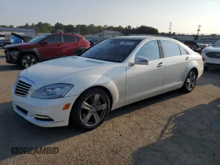 2013 Mercedes-Benz S 550 with VIN WDDNG9EB1DA499672, listed as a Copart auction lot 66051215 with 114,844 mi miles and Salvage title. Bid and sale history available at DreamBid. Image 1.