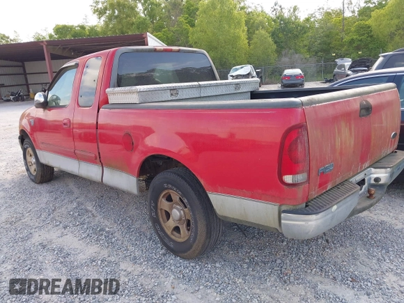 2002 Ford F-150 XL with VIN 1FTRX17W12NA07936, listed as a IAAI auction lot 42068598 with 1 mi miles. Bid and sale history available at carsss.com. Image 3.