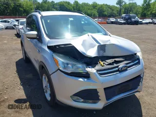 2014 Ford Escape SE with VIN 1FMCU9GX8EUA88526, listed as a IAAI auction lot 42578612 with 22,623 mi miles and . Bid and sale history available at DreamBid. Image 6.