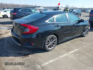 2021 Honda Civic Sedan EX with VIN 19XFC1F32ME206507, listed as a IAAI auction lot 41649684 with 145,491 mi miles. Bid and sale history available at carsss.com. Image 4.