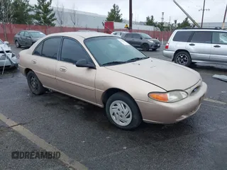 1997 Ford Escort LX with VIN 1FALP13P9VW292877, listed as a IAAI auction lot 41525166 with 91,154 mi miles. Bid and sale history available at carsss.com. Image 1.