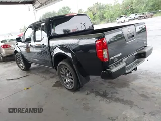 2012 Nissan Frontier SV with VIN 1N6AD0EV1CC411114, listed as a IAAI auction lot 42384760 with 122,399 mi miles and . Bid and sale history available at DreamBid. Image 3.