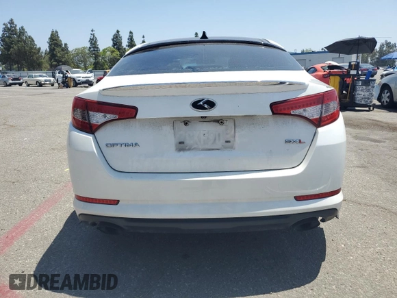 2013 Kia Optima SX z VIN 5XXGR4A60DG193592, wystawiony jako Copart lot #61274435 z przebiegiem 108 251 mil mil oraz Szkoda całkowita • Salvage title. Historia ofert i sprzedaży dostępna na DreamBid. Obrazek 6.