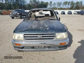 1995 Toyota T100 DX with VIN JT4VD12E1S0012010, listed as a Copart auction lot 83223154 with 253,492 mi miles and Salvage Title. Bid and sale history available at DreamBid. Image 5.