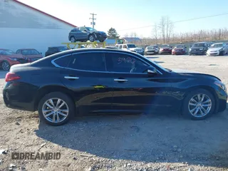 2015 Infiniti Q70 with VIN JN1BY1AR6FM560209, listed as a IAAI auction lot 41703926 with 117,503 mi miles and . Bid and sale history available at DreamBid. Image 13.