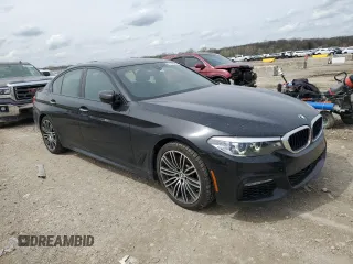 2018 BMW 5 Series 530e xDrive with VIN WBAJB1C51JG623953, listed as a Copart auction lot 51149905 with 86,799 mi miles and Salvage title. Bid and sale history available at DreamBid. Image 4.