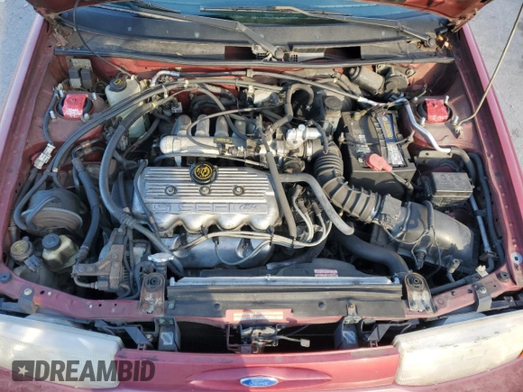 1996 Ford Escort z VIN 1FASP15J7TW112703, wystawiony jako Copart lot #84905564 z przebiegiem 119 575 mil mil oraz Szkoda całkowita • Salvage title. Historia ofert i sprzedaży dostępna na DreamBid. Obrazek 12.