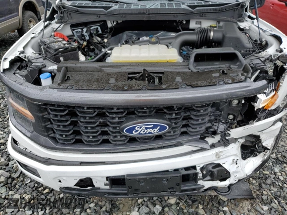 2024 Ford F-150 STX with VIN 1FTEW2LP0RKD27766, listed as a Copart auction lot 52286875 with 9,880 mi miles and Salvage Title. Bid and sale history available at carsss.com. Image 11.