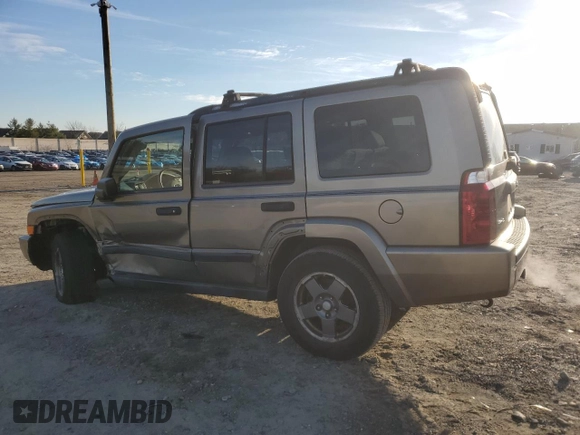 2006 Jeep Commander with VIN 1J8HG48K56C293759, listed as a Copart auction lot 86231064 with 173,203 mi miles and Salvage Title. Bid and sale history available at carsss.com. Image 2.
