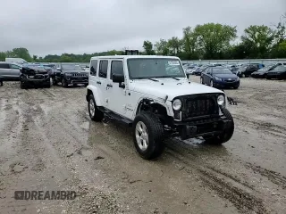 2015 Jeep Wrangler Unlimited Altitude с VIN 1C4HJWEG3FL559879, выставлен на аукционе Copart как лот 61054505 с пробегом 100 123 миль миль и На запчасти • Non repairable. История ставок и продаж доступна на DreamBid. Изображение 15.