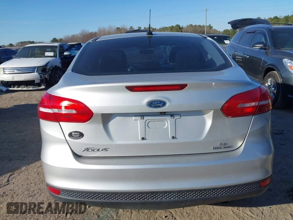 2015 Ford Focus SE with VIN 1FADP3F20FL355058, listed as a IAAI auction lot 41666337 with 144,887 mi miles. Bid and sale history available at carsss.com. Image 16.