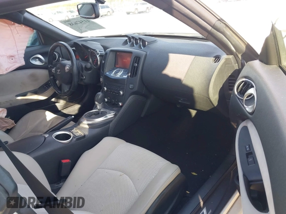 2013 Nissan 370Z z VIN JN1AZ4EH4DM380820, wystawiony jako IAAI lot #41547638 z przebiegiem 118 222 mil mil oraz . Historia ofert i sprzedaży dostępna na DreamBid. Obrazek 5.