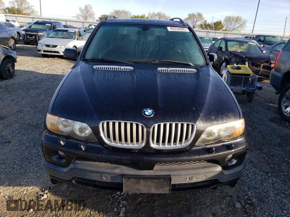 2005 BMW X5 4.8is with VIN 5UXFA935X5LE83006, listed as a Copart auction lot 49554885 with 160,136 mi miles and Clean Title. Bid and sale history available at carsss.com. Image 5.