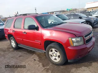 2007 Chevrolet Tahoe LT with VIN 1GNFC13007R275481, listed as a IAAI auction lot 41435767 with 183,818 mi miles and . Bid and sale history available at DreamBid. Image 13.