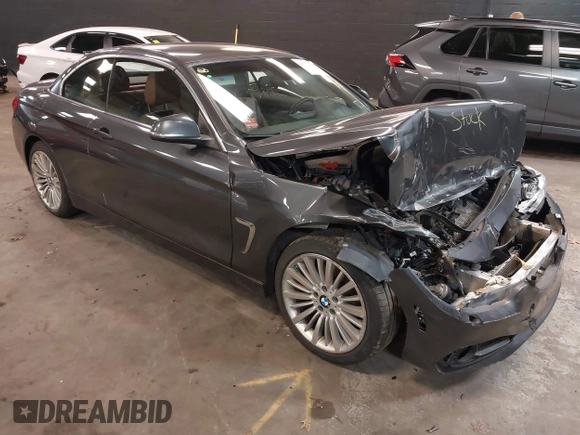 2014 BMW 4 Series 428i xDrive with VIN WBA3T1C59EPS98299, listed as a IAAI auction lot 41741235 with 93,000 mi miles and . Bid and sale history available at carsss.com. Image 1.