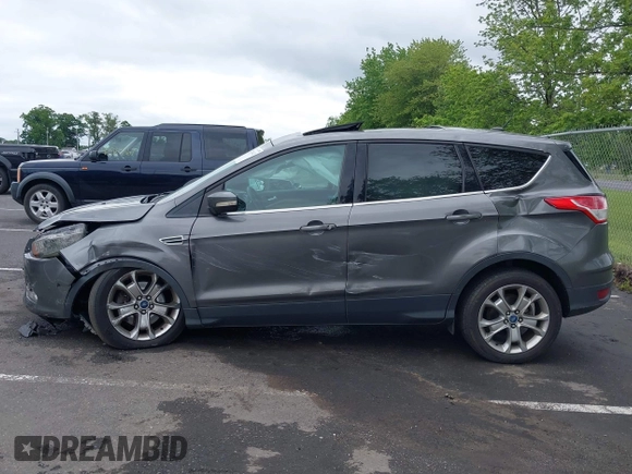 2013 Ford Escape SEL z VIN 1FMCU9H96DUC66206, wystawiony jako IAAI lot #42376442 z przebiegiem 96 776 mil mil oraz . Historia ofert i sprzedaży dostępna na DreamBid. Obrazek 14.