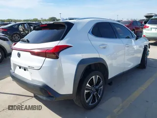 2021 Lexus UX with VIN JTHX3JBH5M2034944, listed as a IAAI auction lot 41068335 with 53,522 mi miles. Bid and sale history available at carsss.com. Image 4.