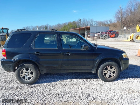 2005 Ford Escape Limited with VIN 1FMCU04155KE23314, listed as a IAAI auction lot 41685671 with 265,731 mi miles. Bid and sale history available at carsss.com. Image 13.
