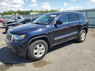 2011 Jeep Grand Cherokee Laredo with VIN 1J4RR4GG1BC639989, listed as a Copart auction lot 57024205 with 75,905 mi miles and Salvage title. Bid and sale history available at DreamBid. Image 1.
