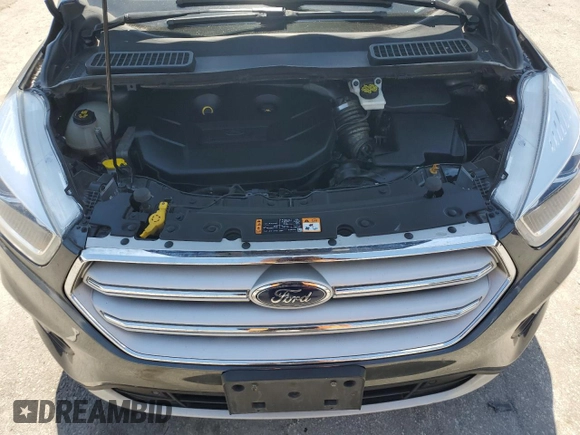 2019 Ford Escape Titanium z VIN 1FMCU9J96KUA65154, wystawiony jako Copart lot #63932325 z przebiegiem 117 963 mil mil oraz Czysty tytuł • Clean title. Historia ofert i sprzedaży dostępna na DreamBid. Obrazek 12.