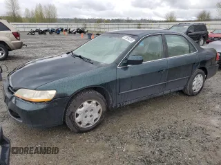 2000 Honda Accord LX z VIN 1HGCG5648YA154043, wystawiony jako Copart lot #51854515 z przebiegiem 176 150 mil mil oraz Szkoda całkowita • Salvage title. Historia ofert i sprzedaży dostępna na DreamBid. Obrazek 1.