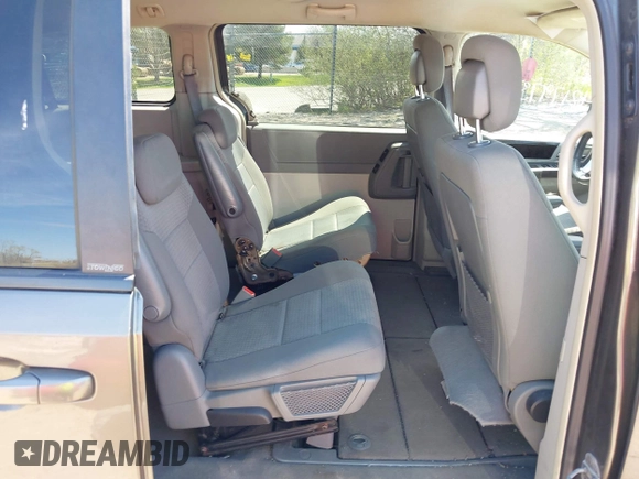 2010 Dodge Grand Caravan SXT with VIN 2D4RN5D1XAR293862, listed as a IAAI auction lot 42179737 with 324,144 mi miles and . Bid and sale history available at DreamBid. Image 8.