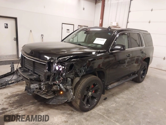 2017 Chevrolet Tahoe LT z VIN 1GNSKBKC6HR310870, wystawiony jako IAAI lot #41975056 z przebiegiem 124 418 mil mil oraz . Historia ofert i sprzedaży dostępna na DreamBid. Obrazek 2.