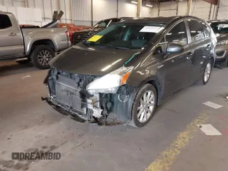 2014 Toyota Prius Two with VIN JTDZN3EU9EJ003633, listed as a IAAI auction lot 41969899 with 138,235 mi miles and . Bid and sale history available at DreamBid. Image 6.
