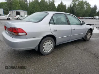 2002 Honda Accord LX z VIN 3HGCG56412G708628, wystawiony jako Copart lot #57347935 z przebiegiem 146 894 mil mil oraz Szkoda całkowita • Salvage title. Historia ofert i sprzedaży dostępna na DreamBid. Obrazek 3.