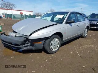 1999 Saturn SL z VIN 1G8ZH5281XZ376254, wystawiony jako IAAI lot #41857372 z przebiegiem 229 836 mil mil oraz . Historia ofert i sprzedaży dostępna na DreamBid. Obrazek 17.