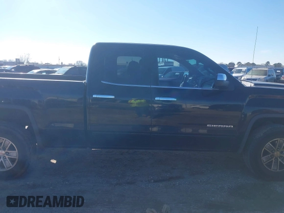 2015 GMC Sierra 1500 SLE z VIN 1GTR1UEC9FZ334983, wystawiony jako IAAI lot #41268146 z przebiegiem 203 084 mil mil oraz . Historia ofert i sprzedaży dostępna na DreamBid. Obrazek 13.