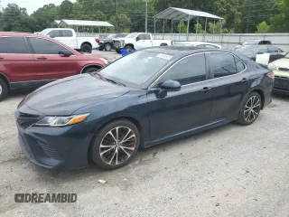 2018 Toyota Camry LE with VIN 4T1B11HK2JU519140, listed as a Copart auction lot 60469525 with 306,092 mi miles and Clean title. Bid and sale history available at DreamBid. Image 1.