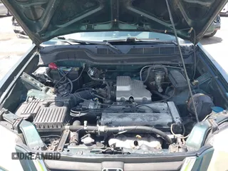 2000 Honda CR-V SE z VIN JHLRD1870YS009867, wystawiony jako IAAI lot #42399220 z przebiegiem 254 367 mil mil oraz . Historia ofert i sprzedaży dostępna na DreamBid. Obrazek 10.
